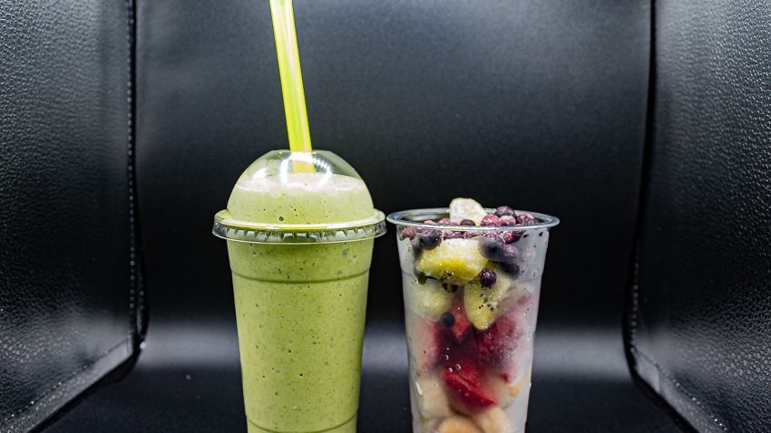 Smoothie and cup of fruit