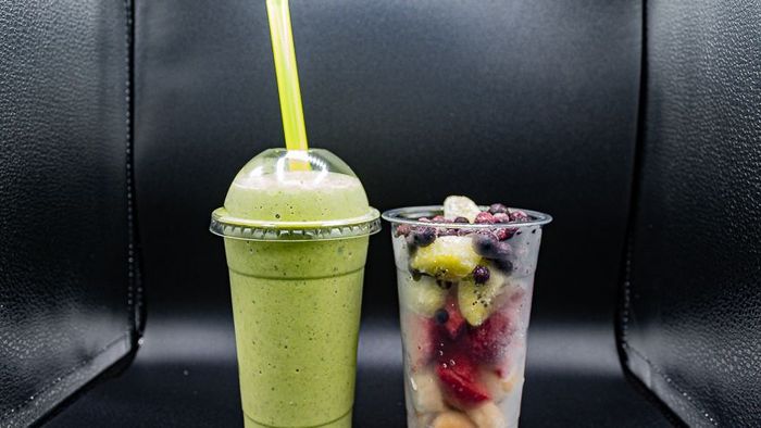 Smoothie and cup of fruit