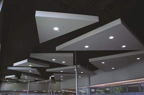 A ceiling with a lot of triangles hanging from it