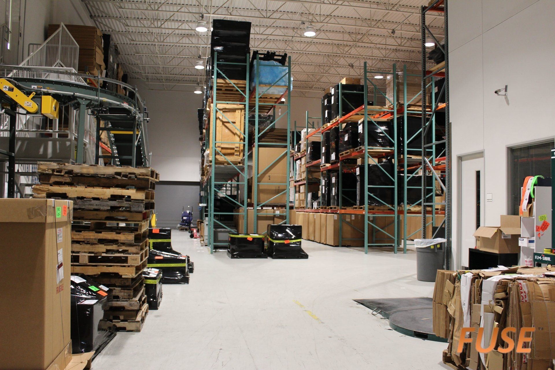 A large warehouse filled with lots of boxes and shelves