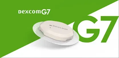 A picture of a dexcom g7 device on a green background.