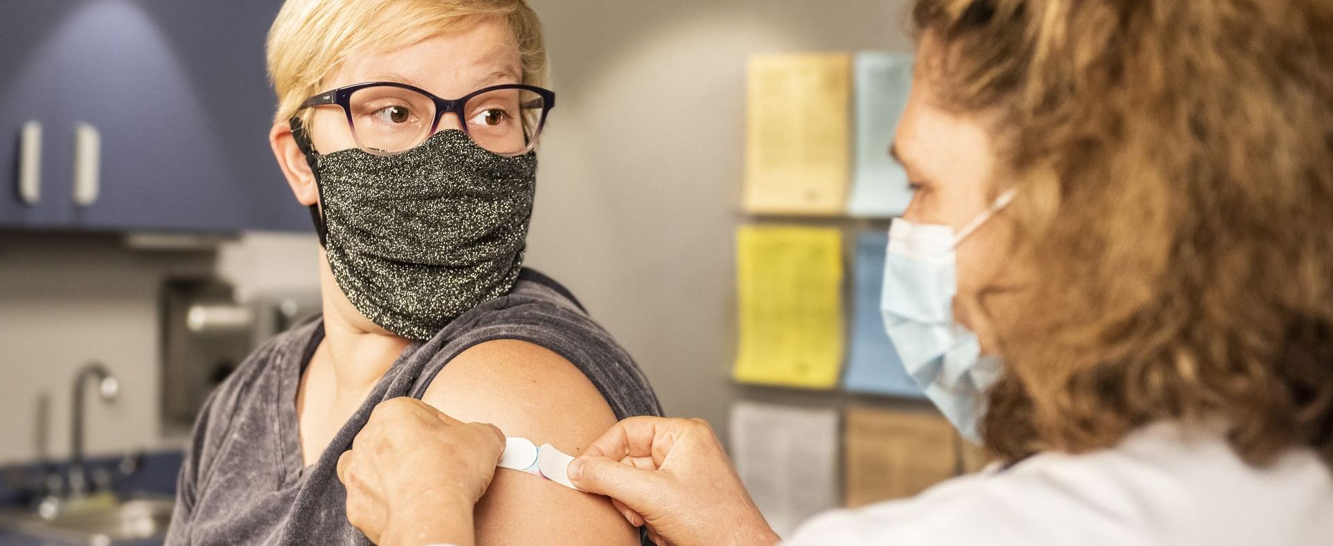 woman getting vaccine