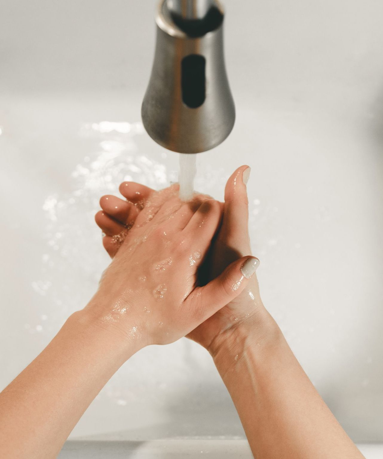 woman washing hands