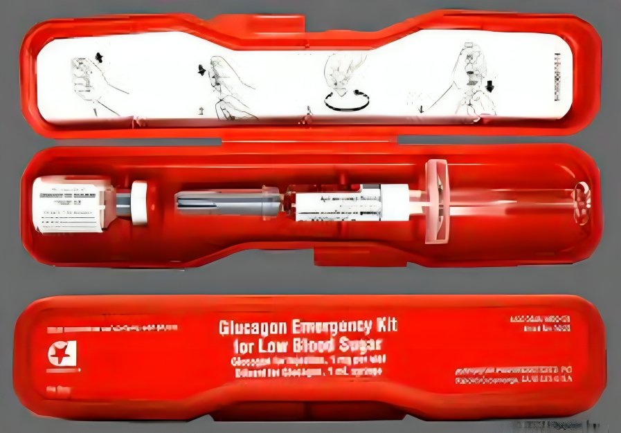 A glucagon emergency kit for low blood sugar in a red case.