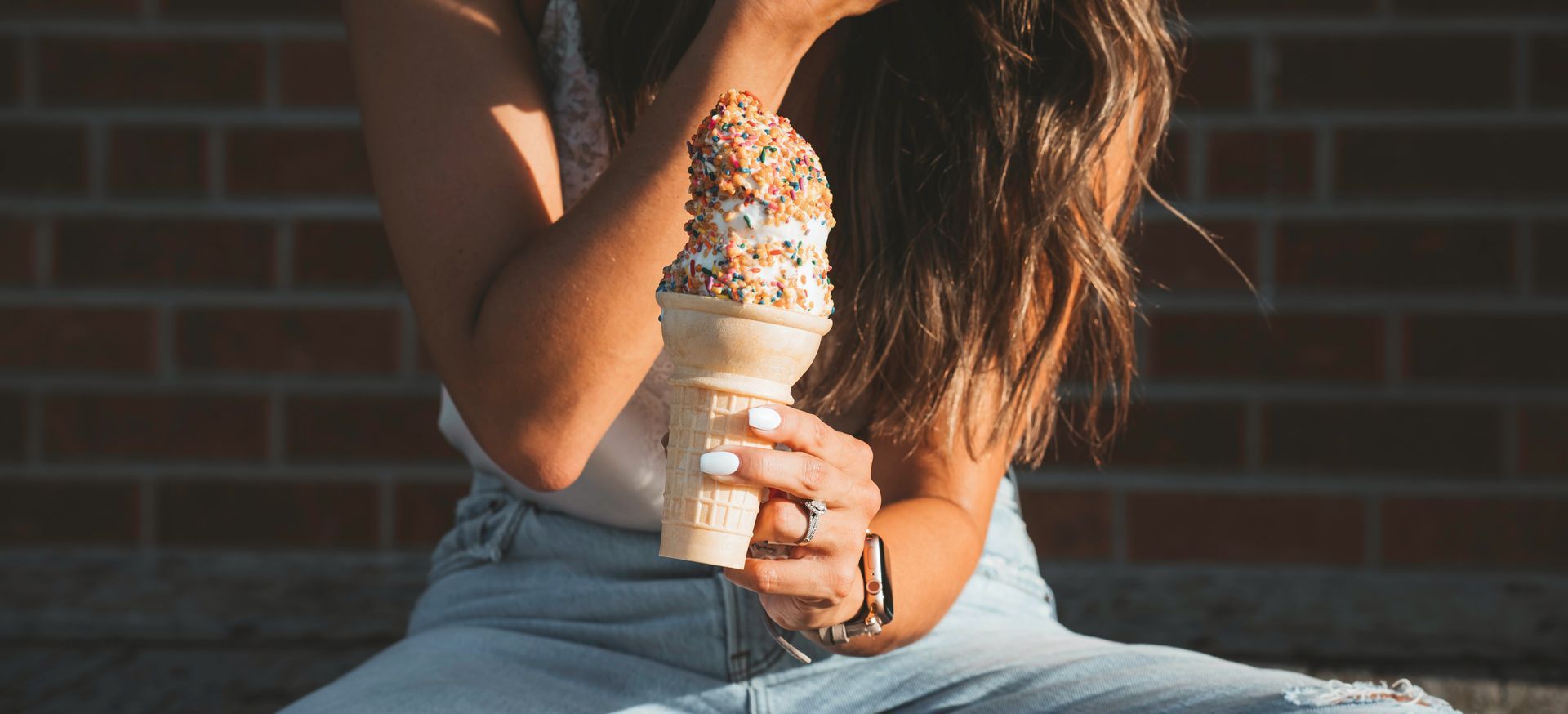 woman eating ice cream cone