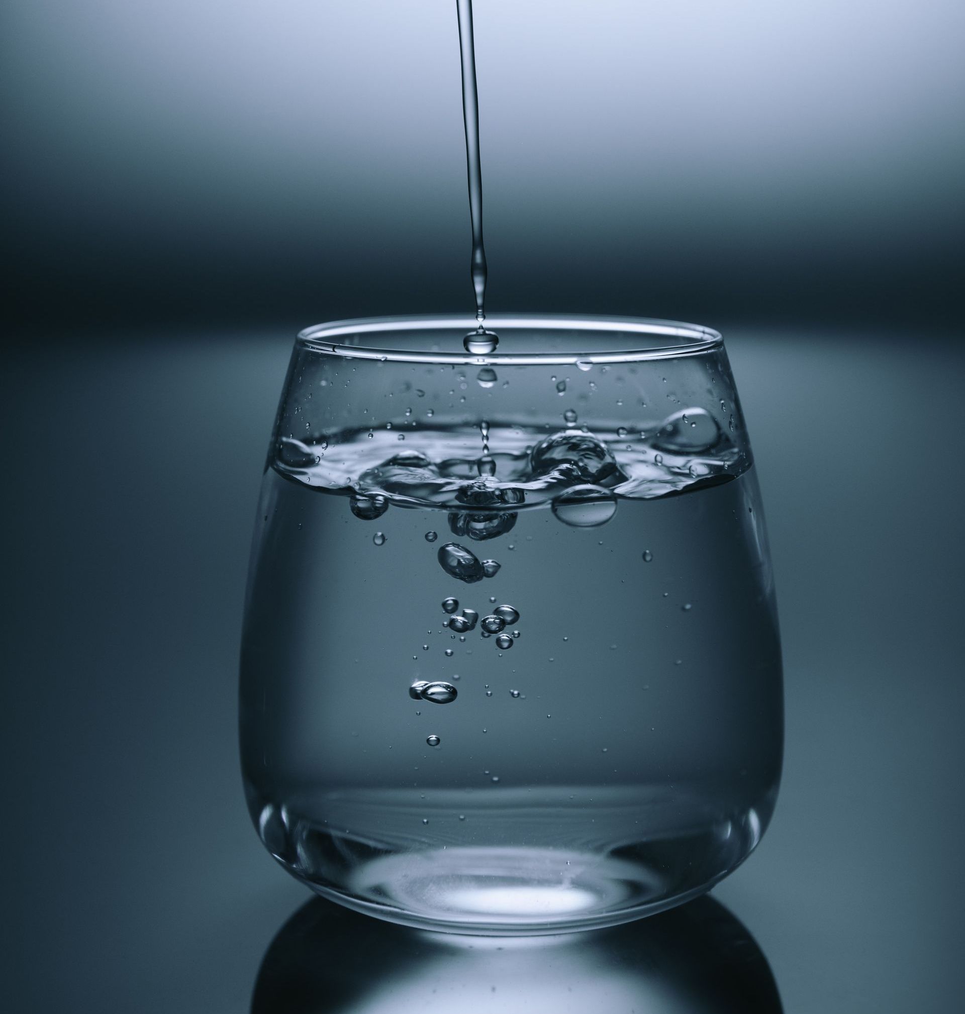 water being poured into glass