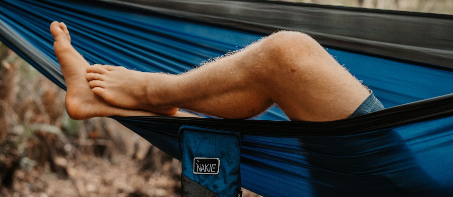 man lying in a hammock