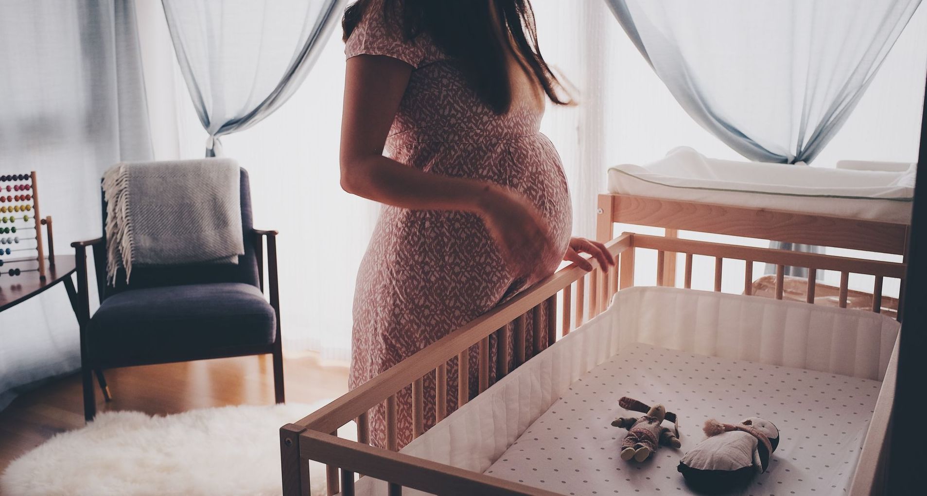 pregnant woman in nursery