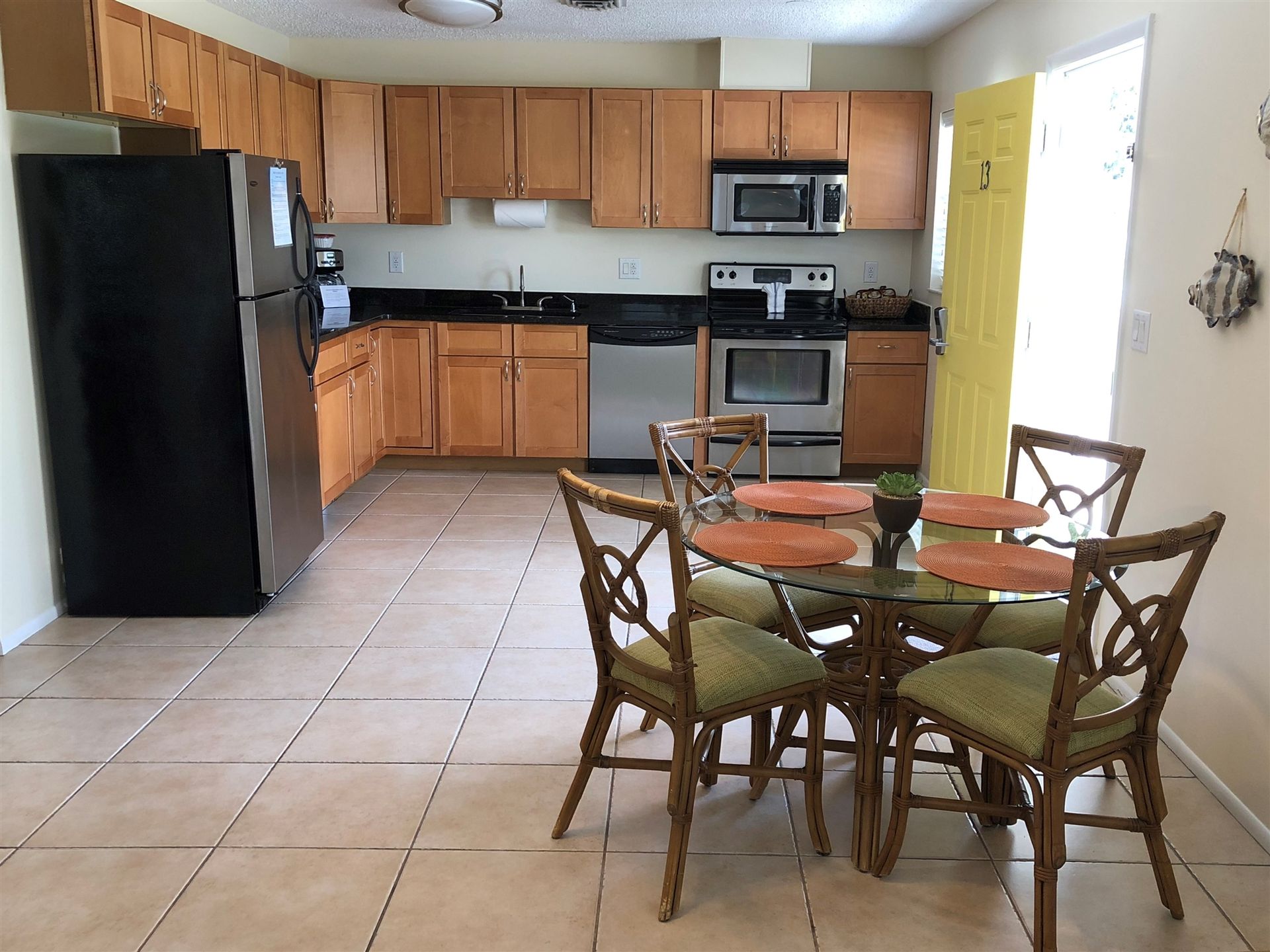 A stack of towels sitting on top of each other on a beach.