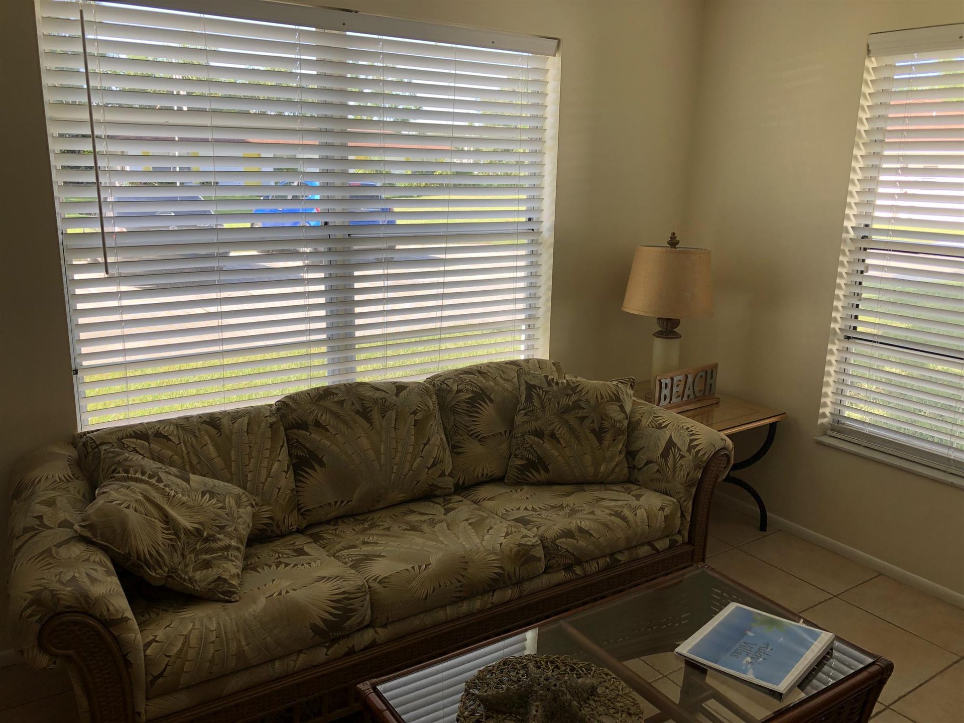 A living room with a couch and a coffee table
