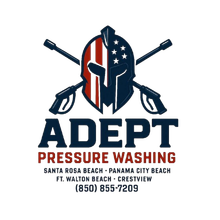 Logo for Adept Pressure Washing, featuring a Spartan helmet styled like the American flag with crossed pressure washers.