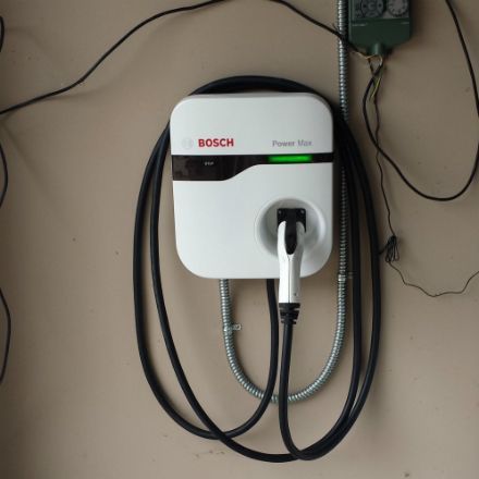 A bosch power box is attached to a wall