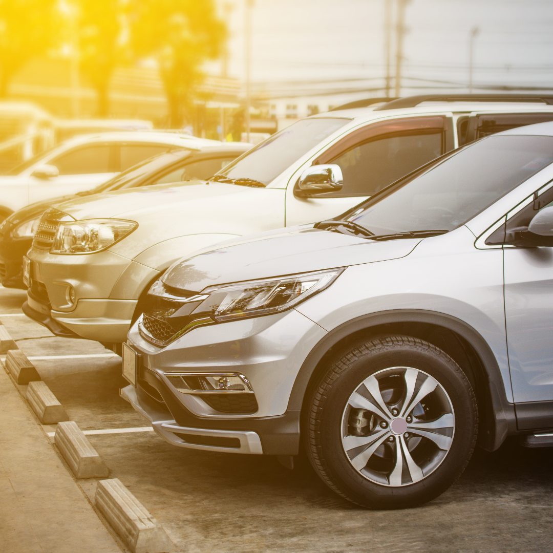 Cars lined up in a parkting lot