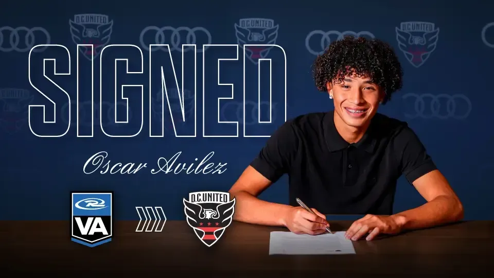 Soccer player Oscar Avilez signs contract, navy background, Audi logo, team logos.