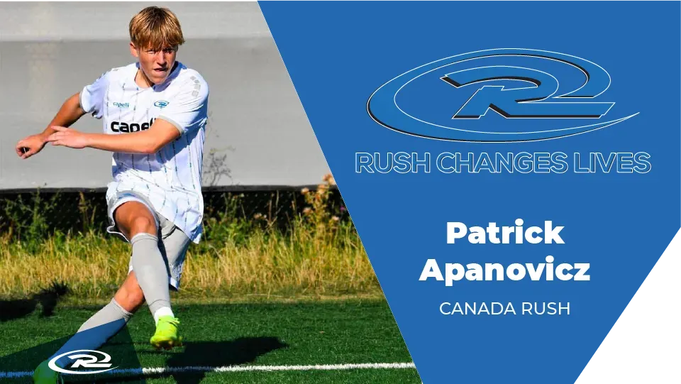 Soccer player Patrick Apanovicz of Canada Rush kicking the ball on a green field. Blue background, logo.
