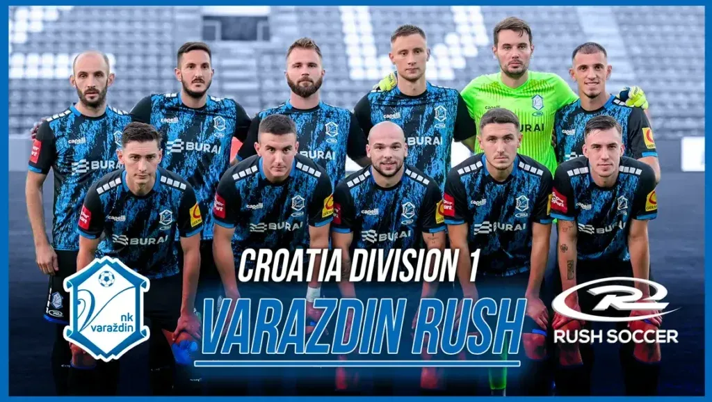 Soccer team, Varazdin Rush, posing for a group photo in Croatia. They wear blue jerseys with a logo and sponsor.