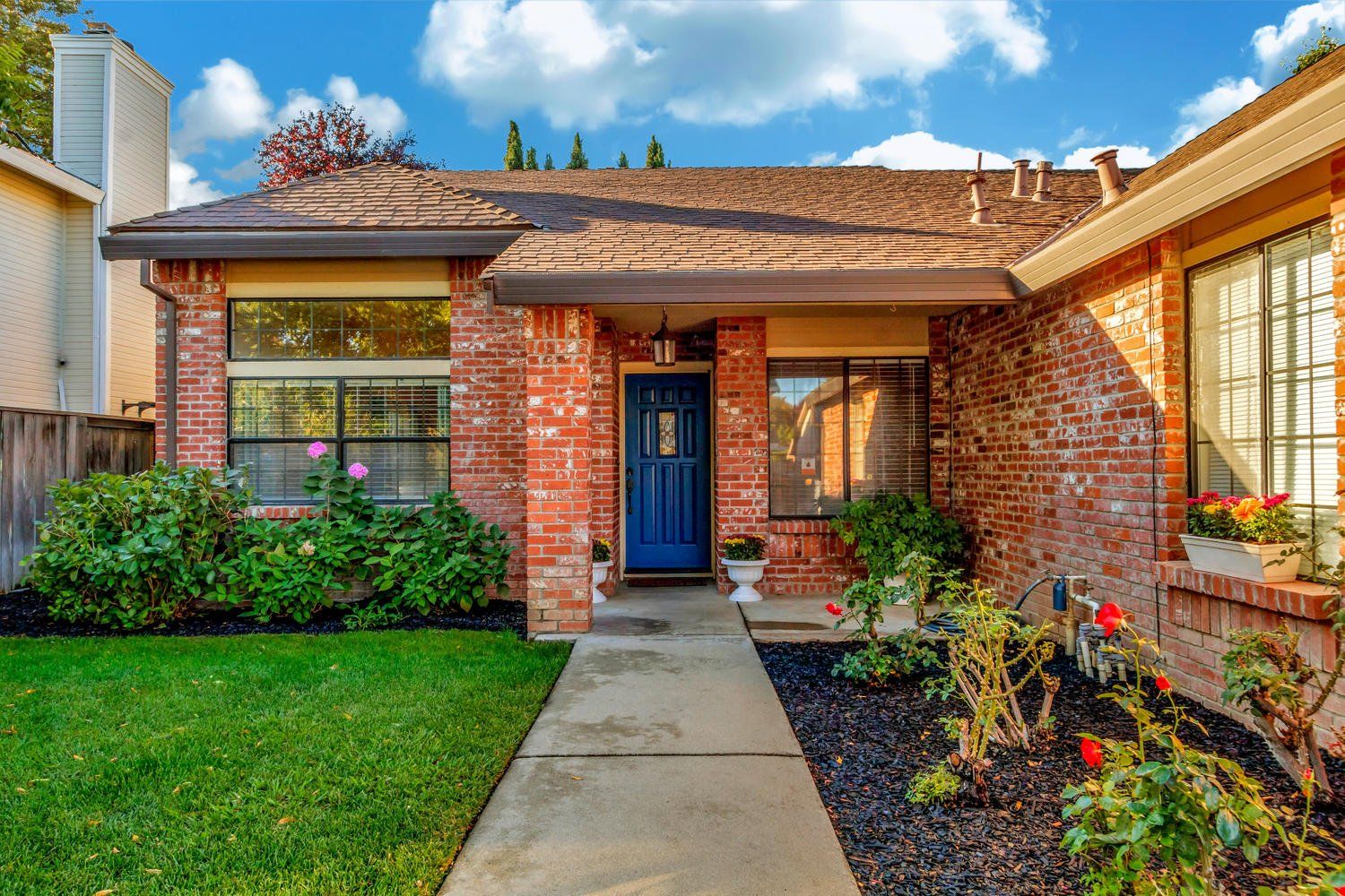 Beautiful Brick House with a walkway and garden | Find homes for sale in Greenhaven-Pocket, CA w/ Catricala Real Estate Group