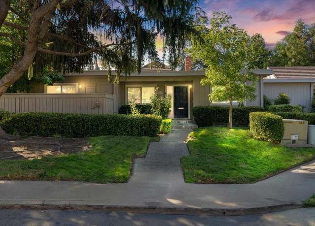 A house with a fence and a tree in front of it | Homes for Sale in Greenhaven-Pocket, Sacramento, CA