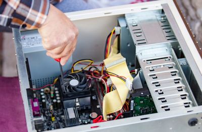 Computer Support — System Unit Being Repaired By Computer Technician in Saint Paul, MN