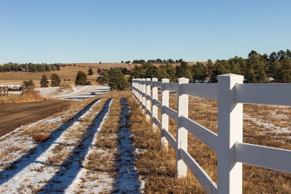 Gabion Wall Filled With White Stones — A&H Fences In Aylmerton, NSW