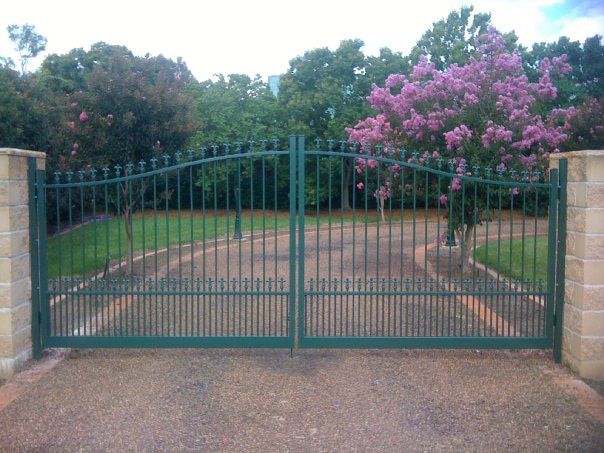 Green Iron Gate With Decorative Tops — A&H Fences In Bowral, NSW