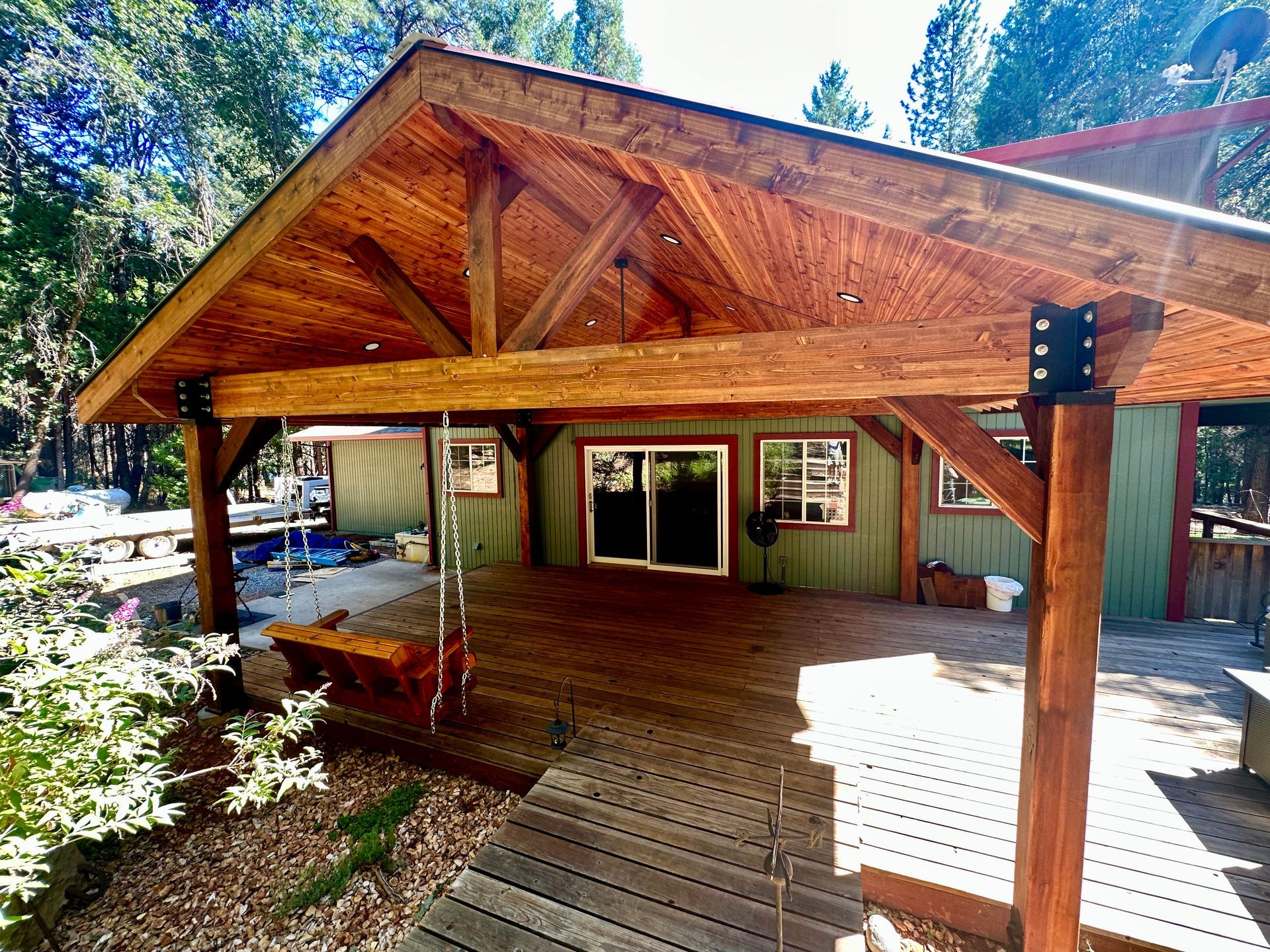 A house with a wooden roof and a wooden deck