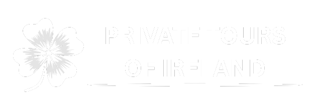 Logo featuring a four-leaf clover and text to its right, all in white.