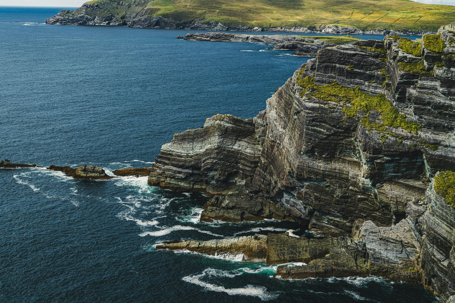 The breathtaking cliffs along Ireland's Wild Atlantic Way at sunset.