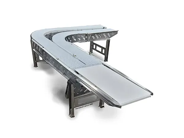 Three connected conveyor belts in a manufacturing setting, stainless steel frame.