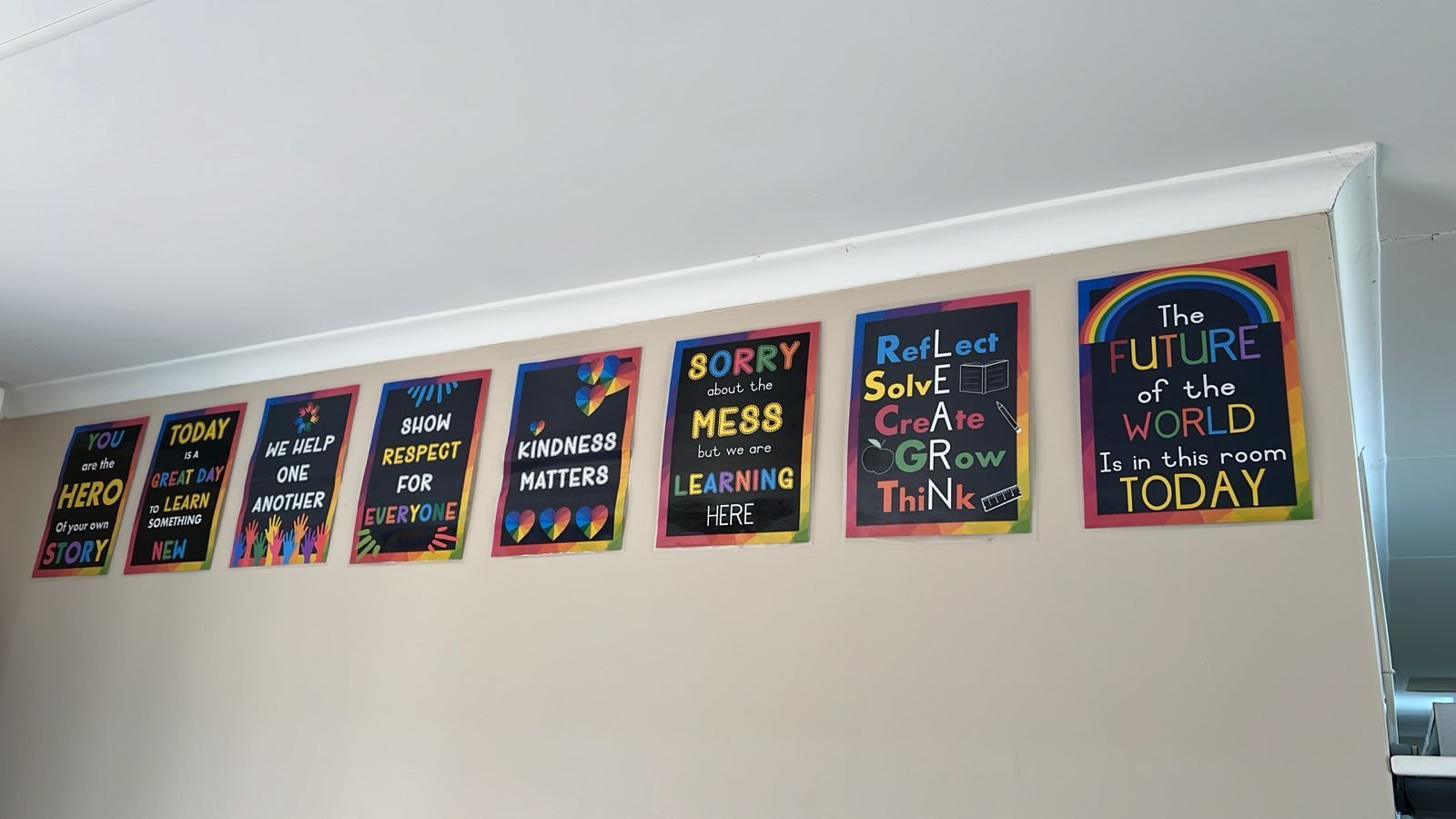 Signs against the wall at Diverse Skills Academy.