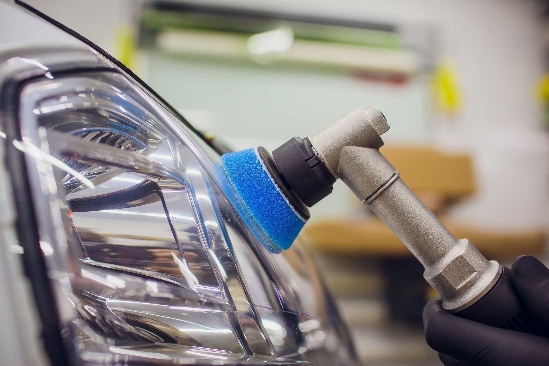 Auto Mechanic Buffing And Polishing Car Headlight — Hyattsville, MD — Rivas Auto Glass