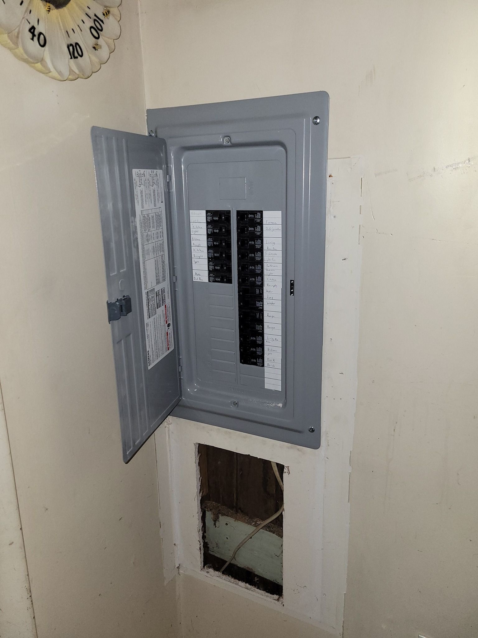 An aerial view of a large wave in the ocean.
