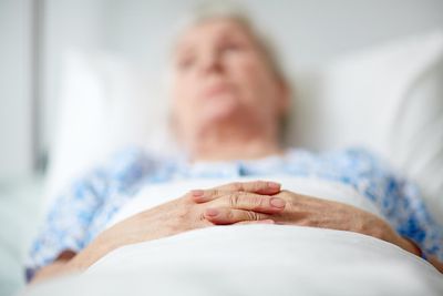 older woman in a hospital bed