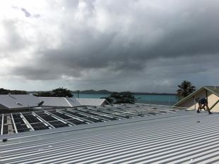 Reroofing With Gray Roof — Plumbers in  Mareeba, QLD