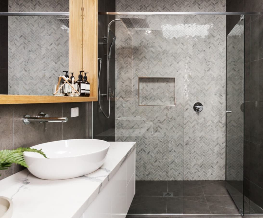 A Bathroom With Two Sinks And A Walk In Shower — Content Stone In Coffs Harbour, NSW