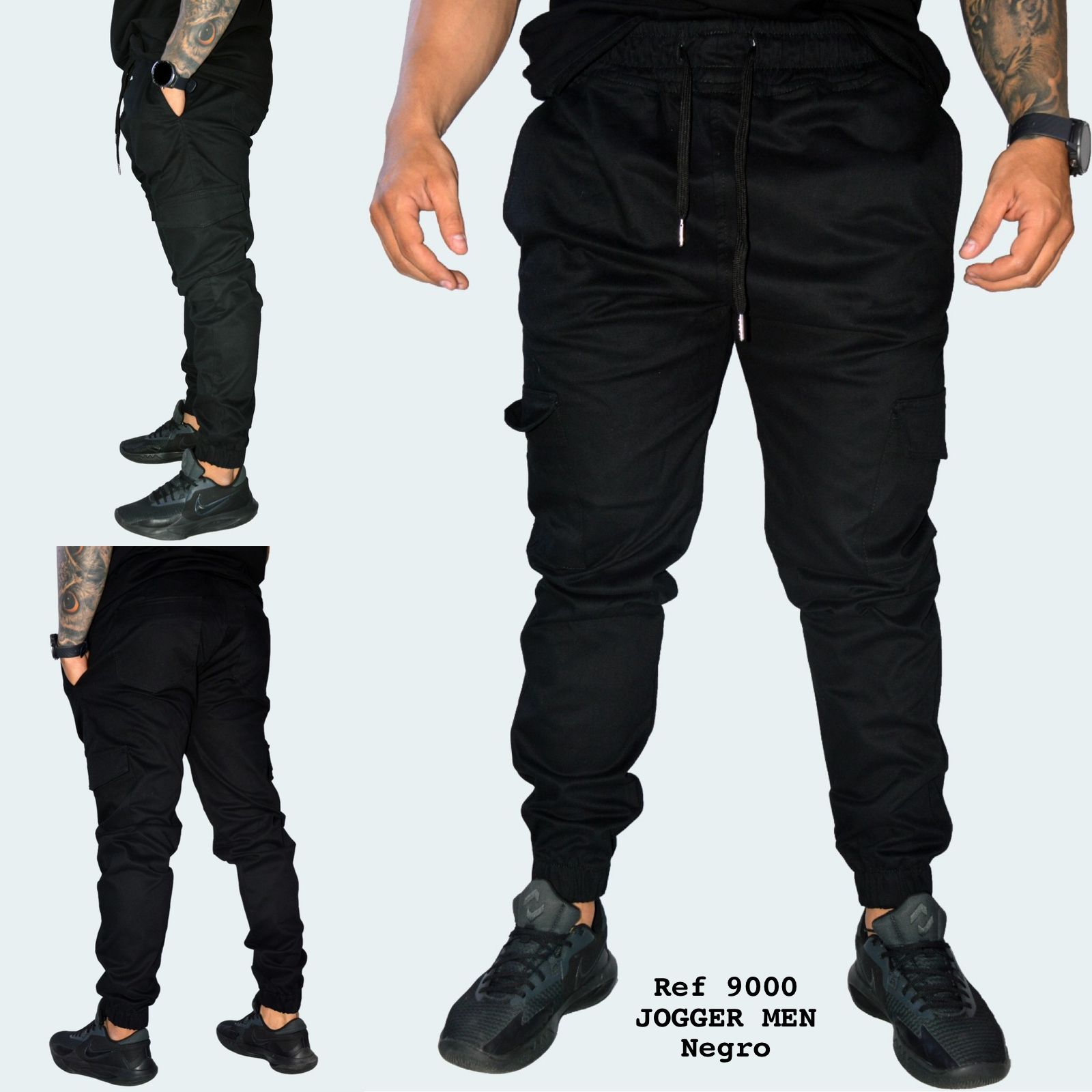 Un hombre lleva un par de pantalones deportivos negros