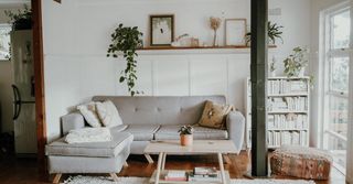 A living room with a couch and a coffee table.