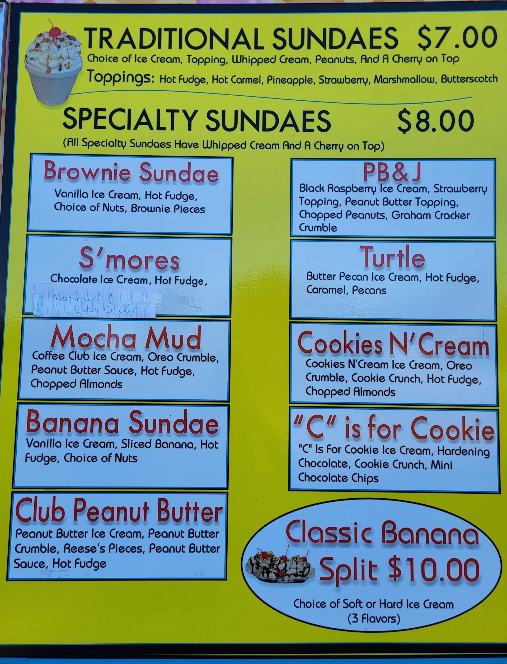 Ice cream menu with sundae options and prices.