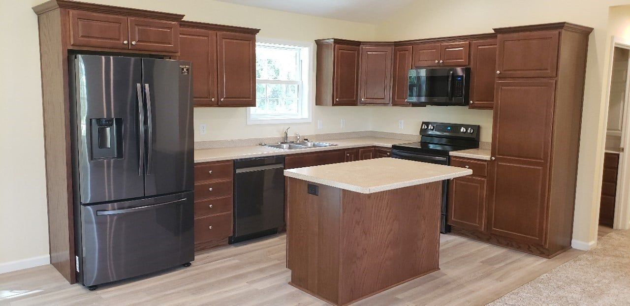 Kitchen with Black Refrigerator — Mansfield, OH — Zara Construction, Inc.