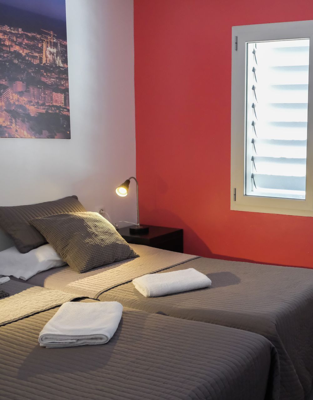 A bathroom with two sinks and a mirror