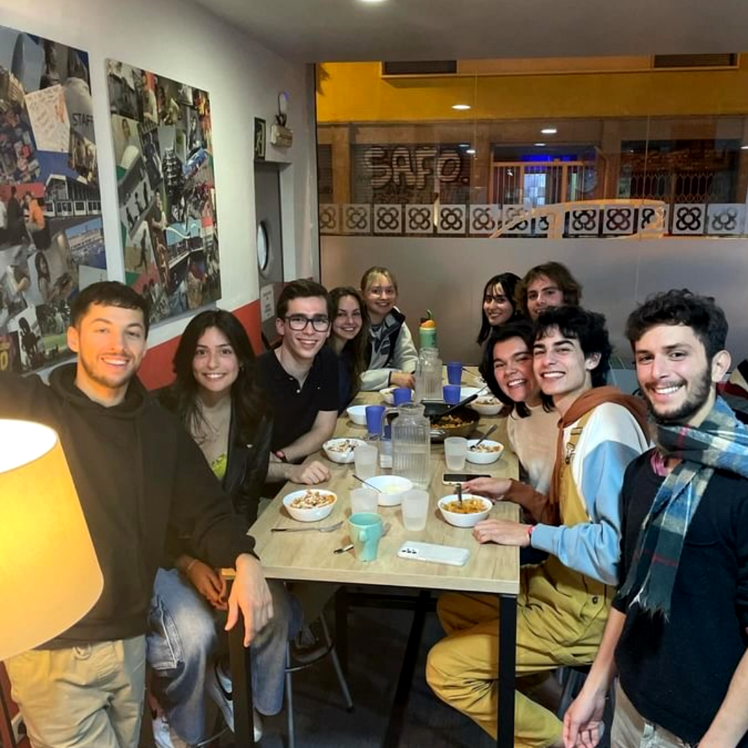 A group of guests enjoying pasta for dinner