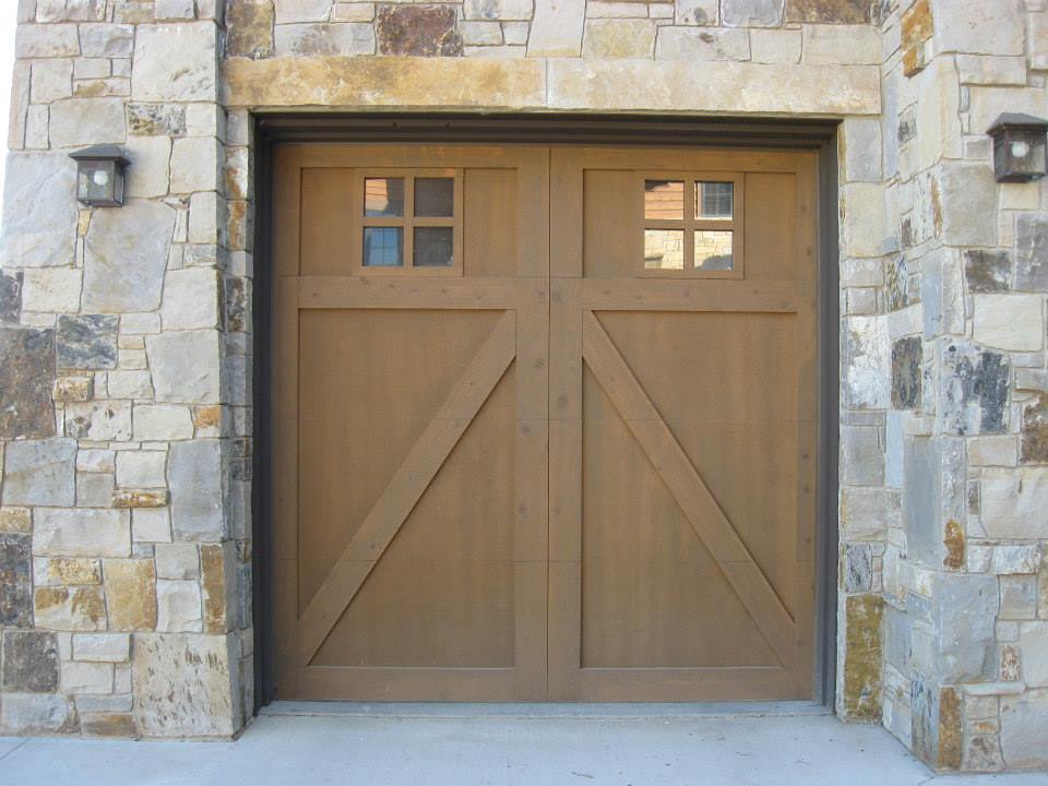 Custom-Made Garage Doors — Customized Brown Garage Door In A Brick Wall in Durango, CO