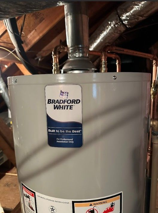 A bradford white water heater is sitting in a basement.