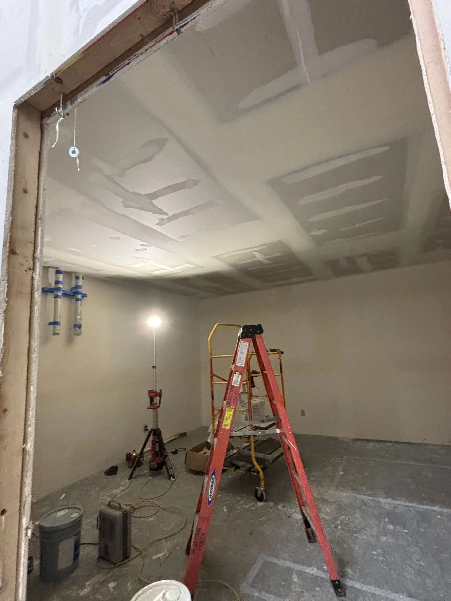 There is a ladder in the middle of the room.