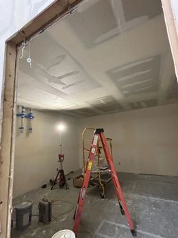 There is a ladder in the middle of the room.