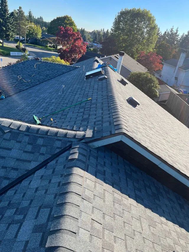 The roof of a house with a lot of shingles on it.