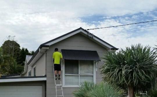 White And Gray Home Exterior — Heritage Window Awnings in Cessnock, NSW