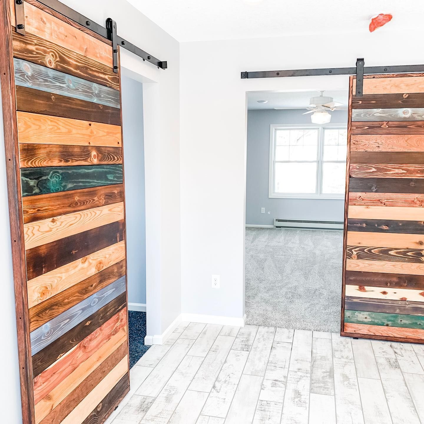 Two Wooden Sliding Door — Annandale, MN — Lakewood Homes & Remodeling LLC