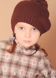 Caps — Young Girl Wearing Maroon Cap in Vista, CA