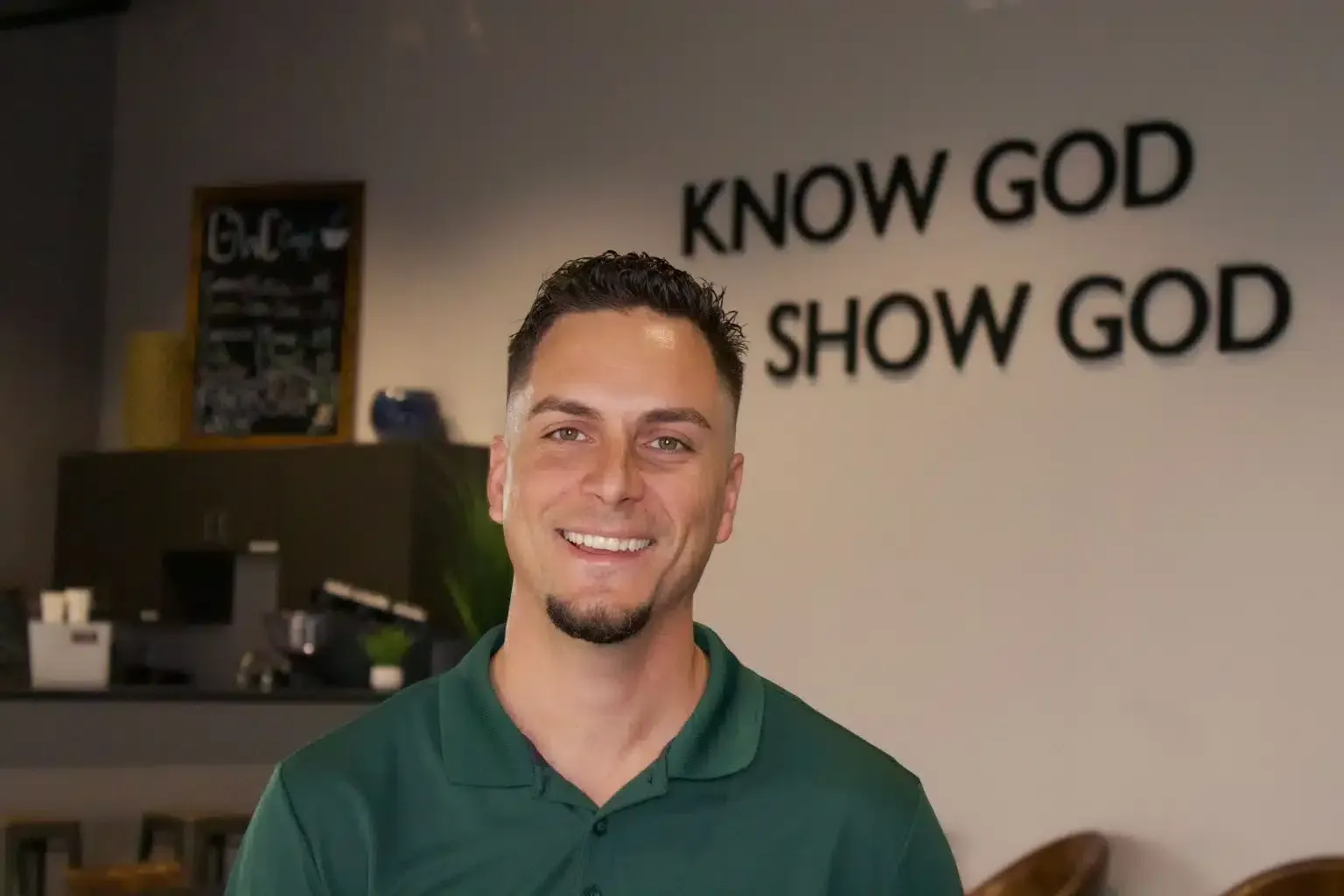 Man smiling in front of 